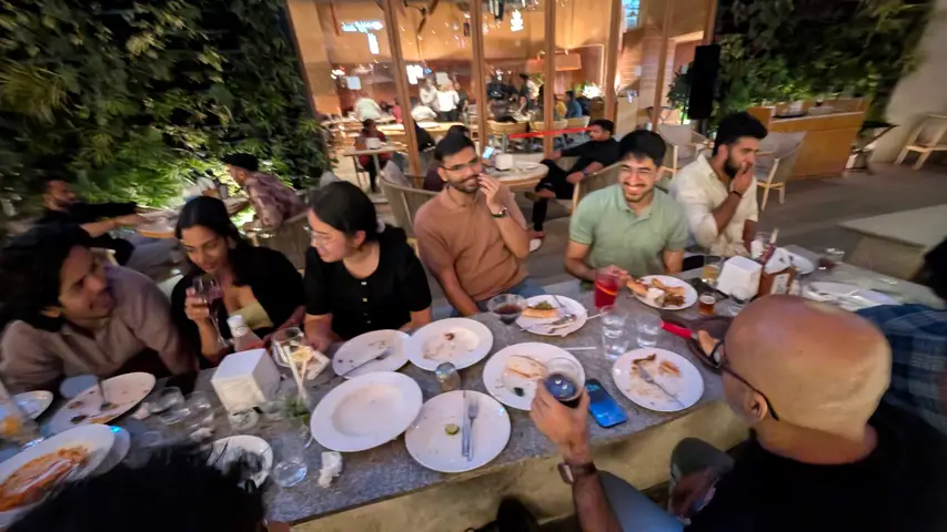 The long table near the end of a team dinner